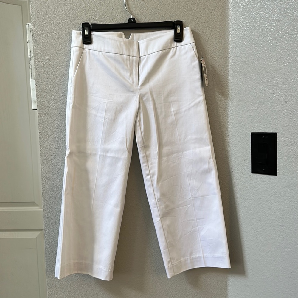 Attention brand white capris.